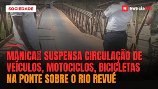 Manicaː Suspensa circulação de veículos, motociclos, bicicletas na ponte sobre o rio Revué